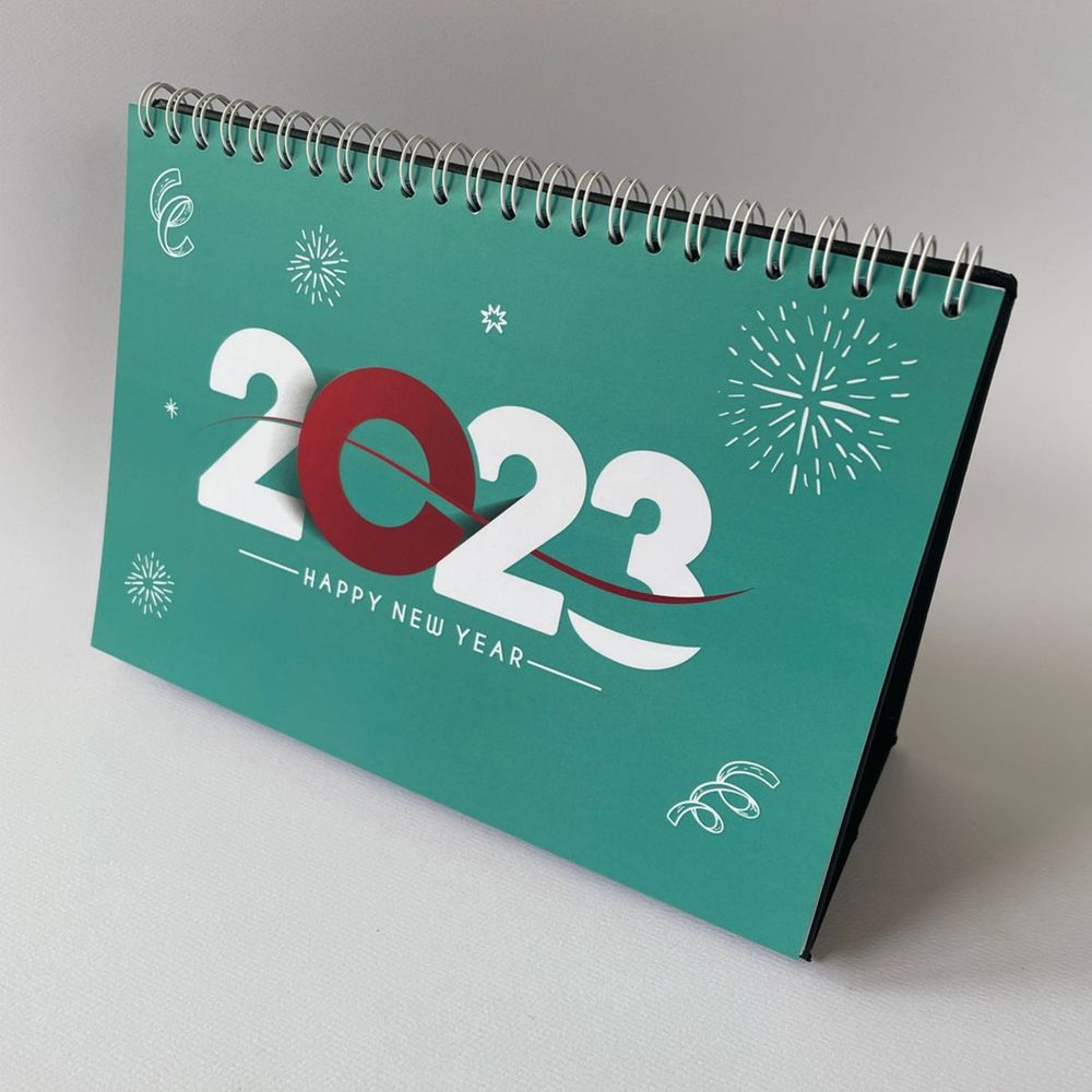 https://d3pyarv4eotqu4.cloudfront.net/printaholi/images/products_gallery_images/Kalender_2023_Tokped_2.jpg