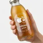 Premium white ink transparent labels for glass bottles, jars & luxury packaging with vibrant professional printing.