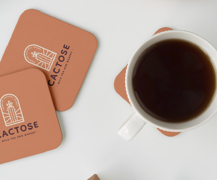 Coffee shop with branded coasters