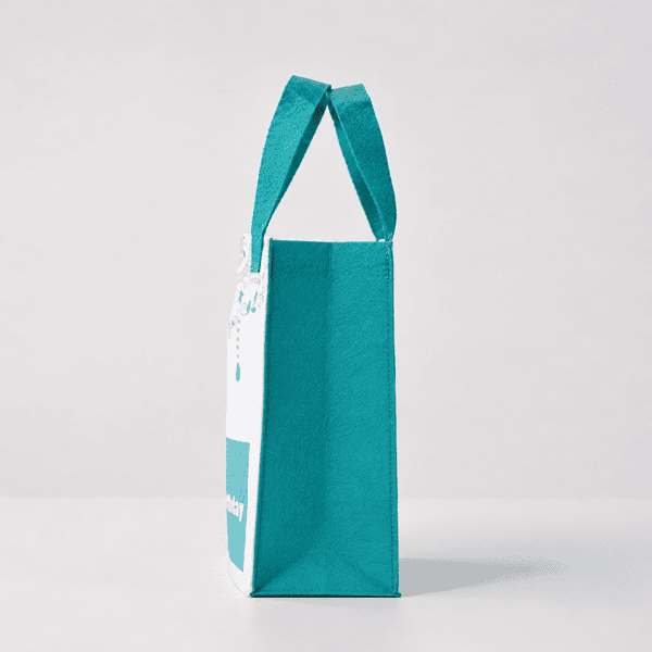 Custom printed Enviro bag side view with teal handles for gifting and events