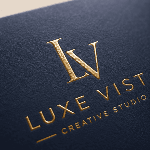 Macro close-up of raised gold foil embossing on a premium business card