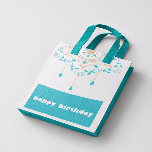 Printed Enviro bag for birthday gifting with reusable teal handles