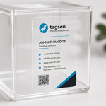 Transparent visiting card sticker mockup on clear packaging surface